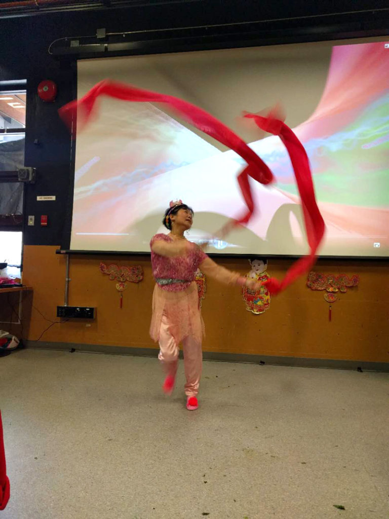Eva Cho dancing, picture of Eva dancing with ribbons